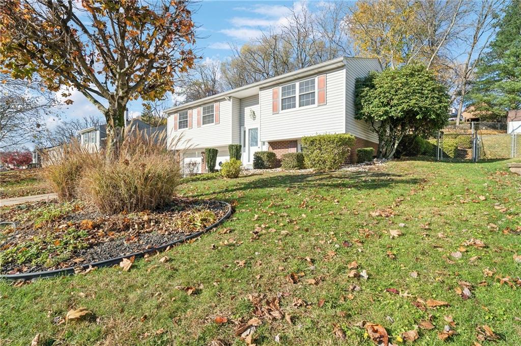 1828 Ivanhoe Drive Irwin, PA 15642 - Photo 2 of 33 a view of a house with a yard