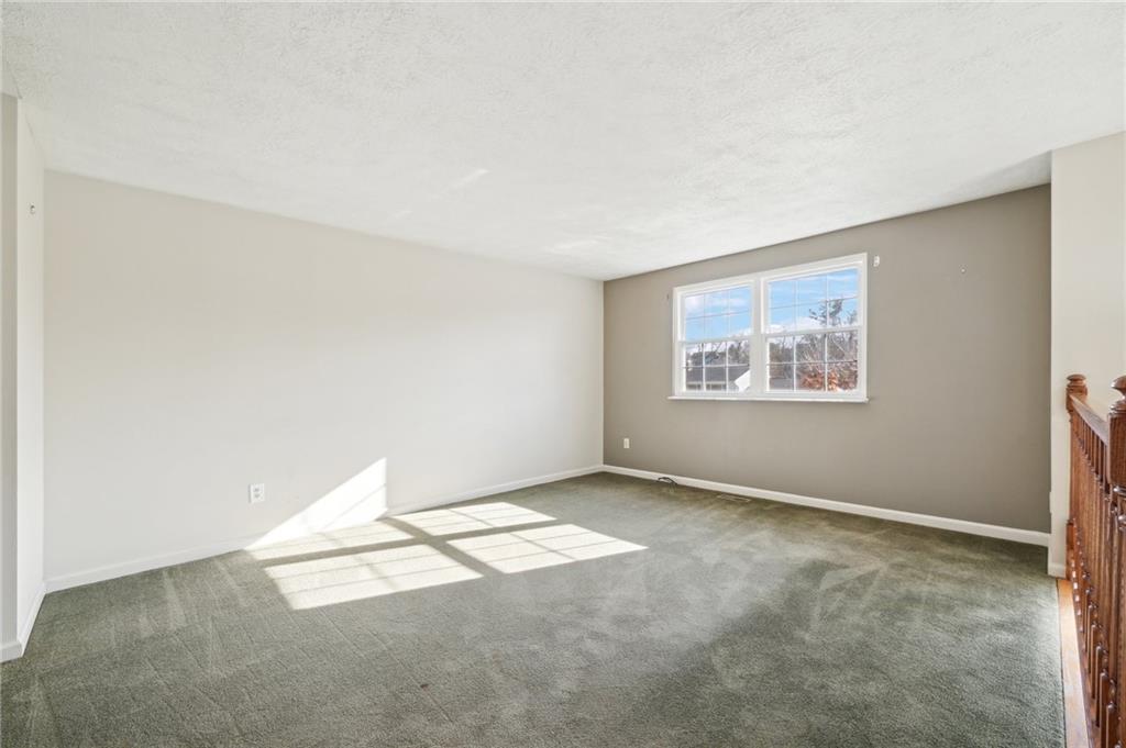 1828 Ivanhoe Drive Irwin, PA 15642 - Photo 5 of 33 an empty room with windows