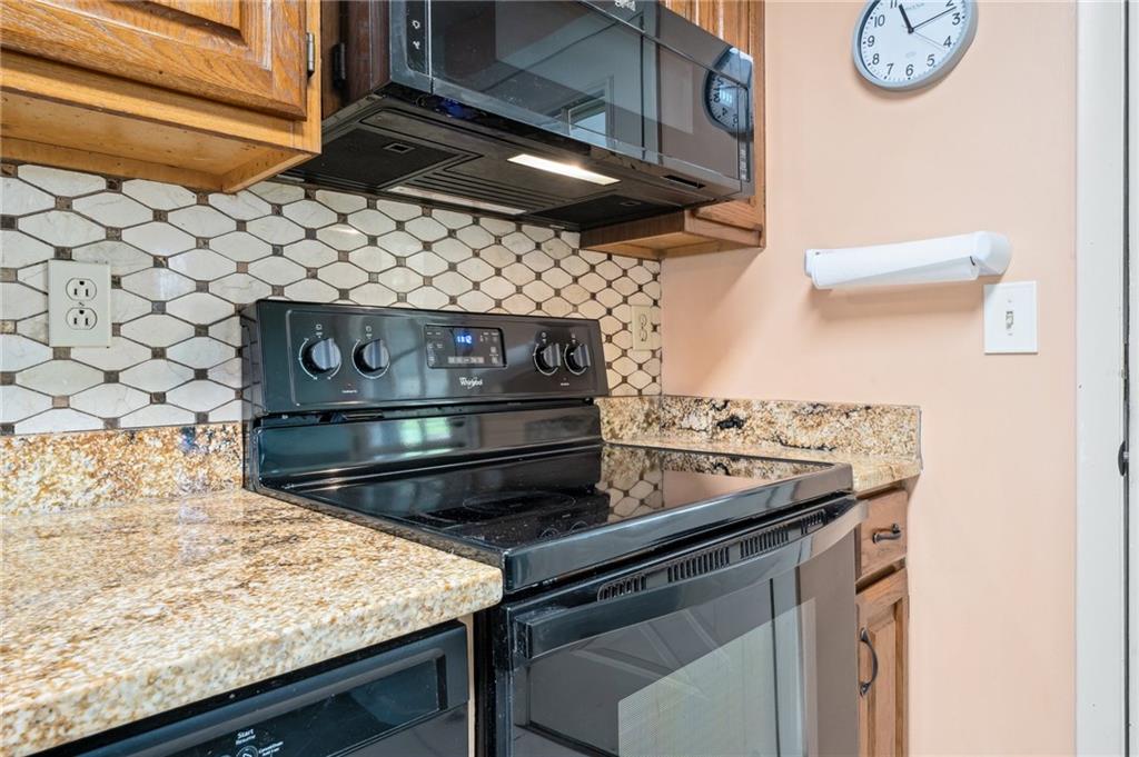 1828 Ivanhoe Drive Irwin, PA 15642 - Photo 8 of 33 a kitchen view of a stove and a microwave oven