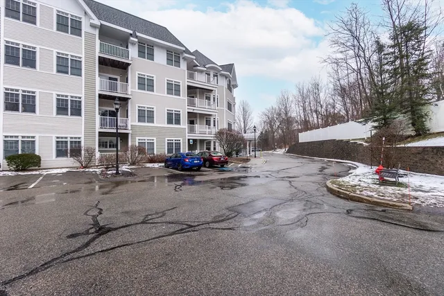 a view of a street with cars