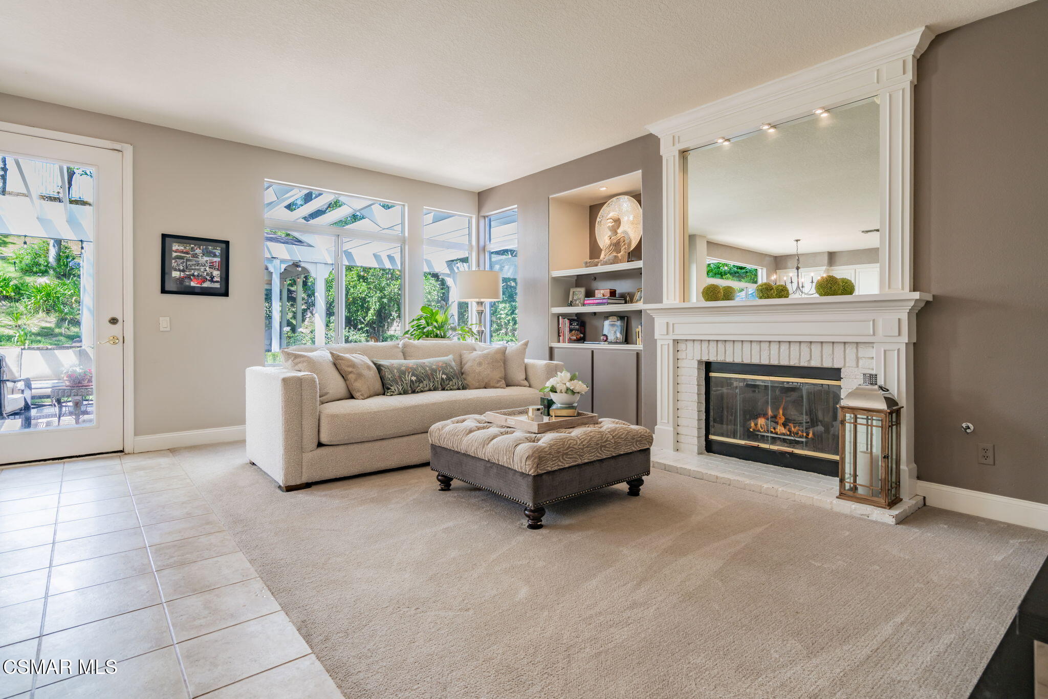 15591 Harte Lane Moorpark, CA 93021 - Photo 15 of 52 a living room with furniture and a fireplace