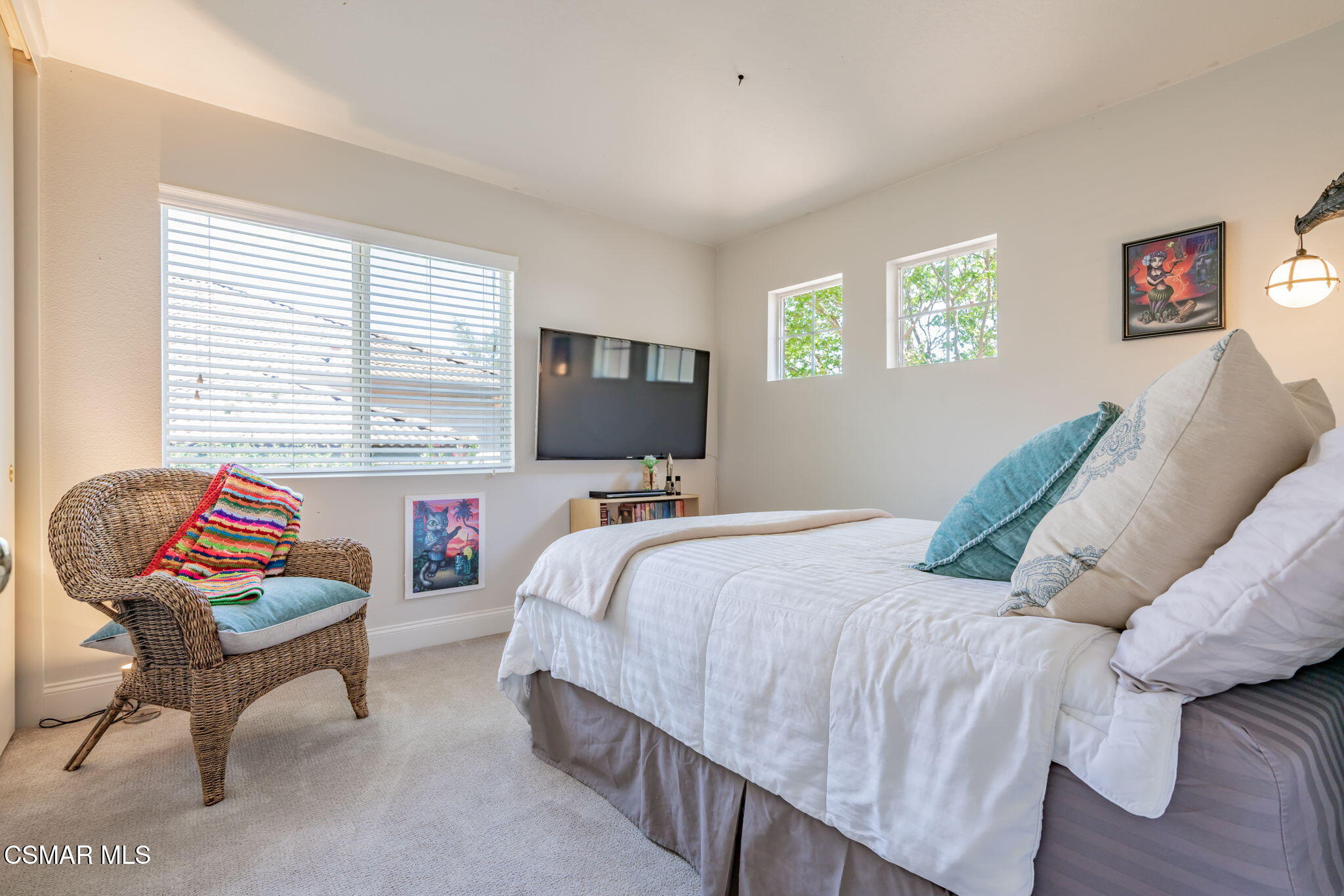 15591 Harte Lane Moorpark, CA 93021 - Photo 24 of 52 a bedroom with a bed and wooden floor