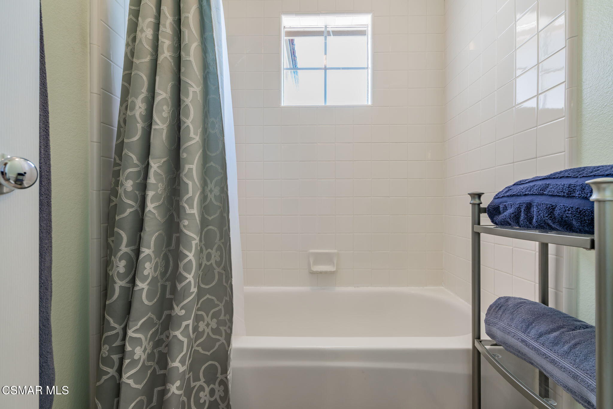 15591 Harte Lane Moorpark, CA 93021 - Photo 27 of 52 a bathroom with a bathtub and a shower