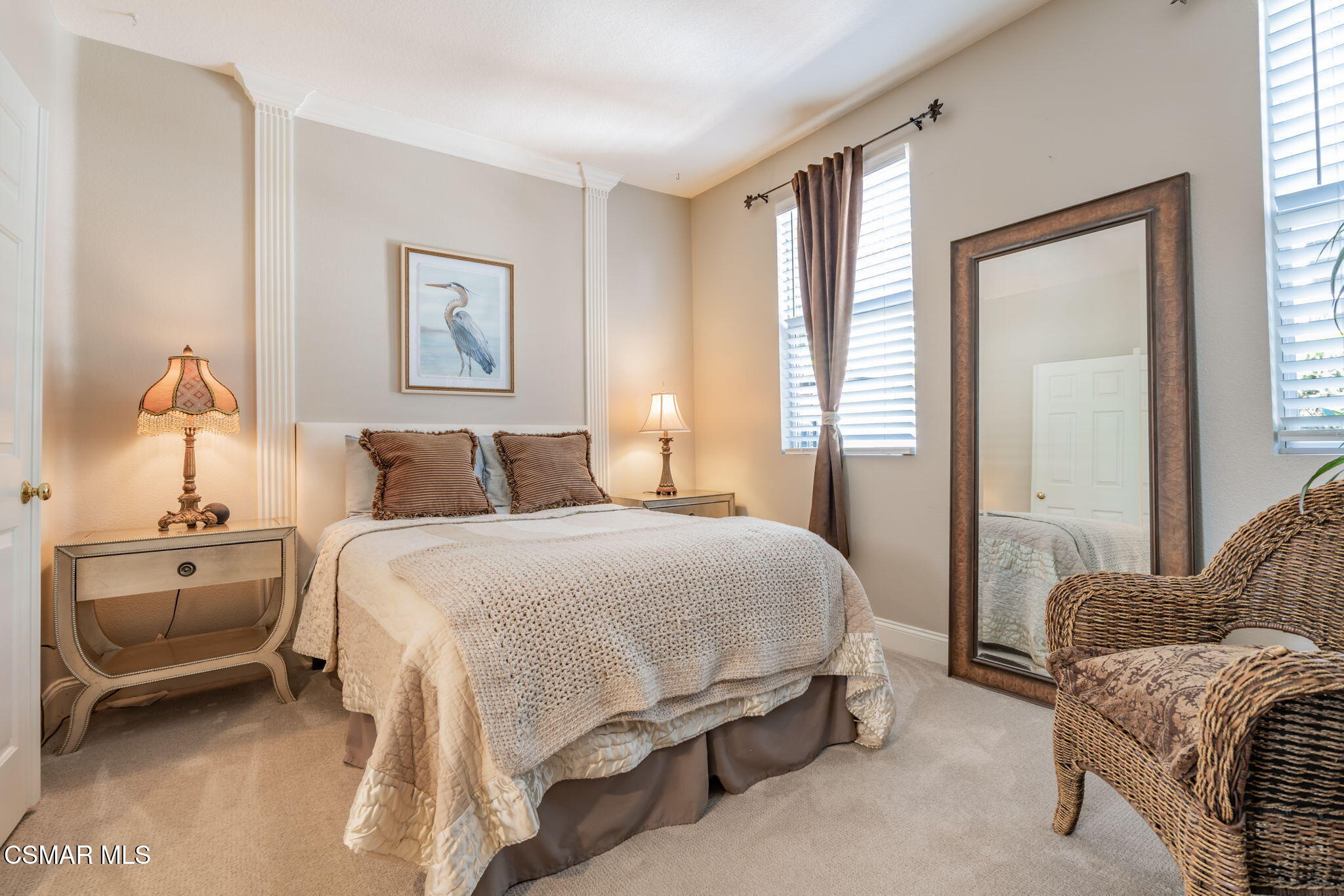 15591 Harte Lane Moorpark, CA 93021 - Photo 29 of 52 a bedroom with a bed and wooden floor