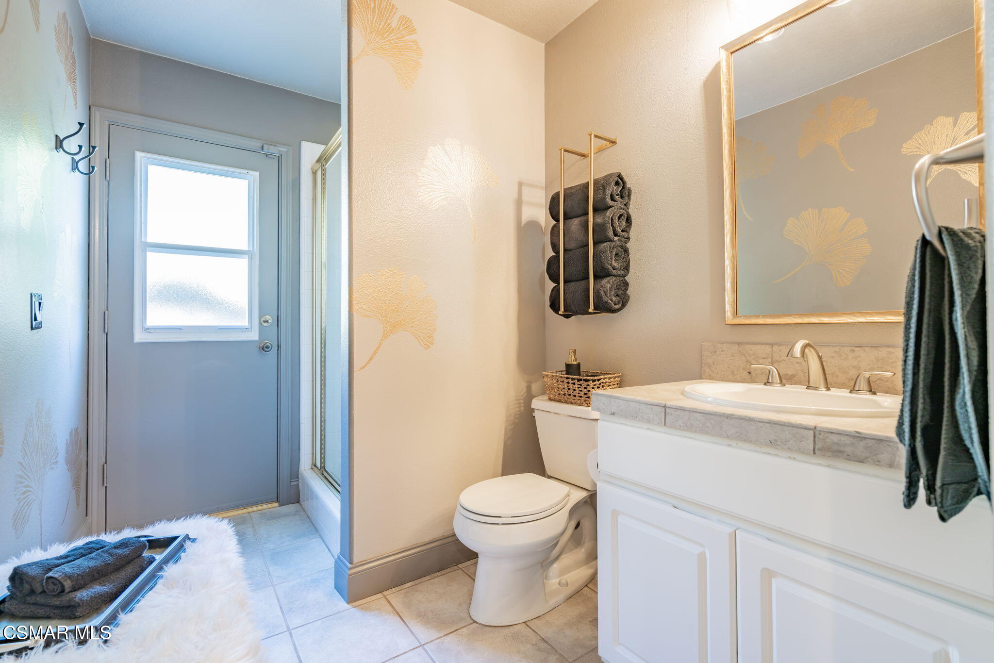 15591 Harte Lane Moorpark, CA 93021 - Photo 30 of 52 a bathroom with a granite countertop sink toilet and shower