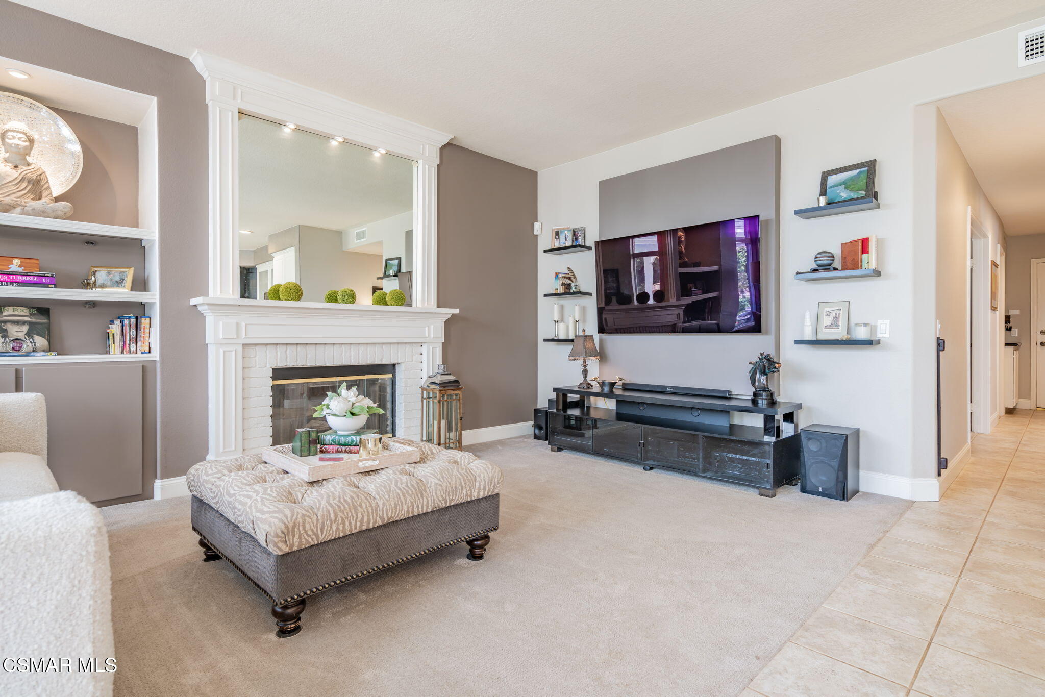 15591 Harte Lane Moorpark, CA 93021 - Photo 3 of 52 a living room with furniture and a fireplace
