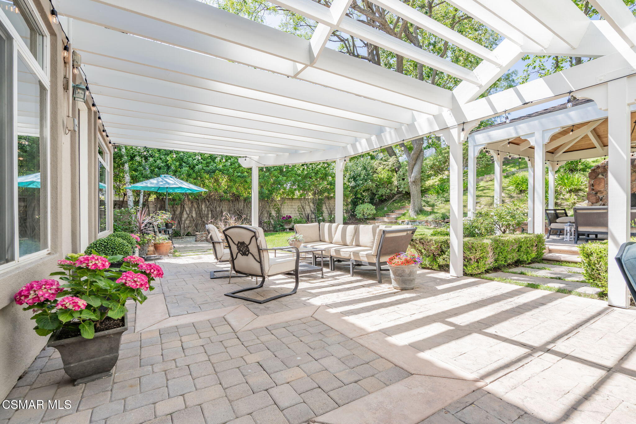 15591 Harte Lane Moorpark, CA 93021 - Photo 33 of 52 a building outdoor space with seating space