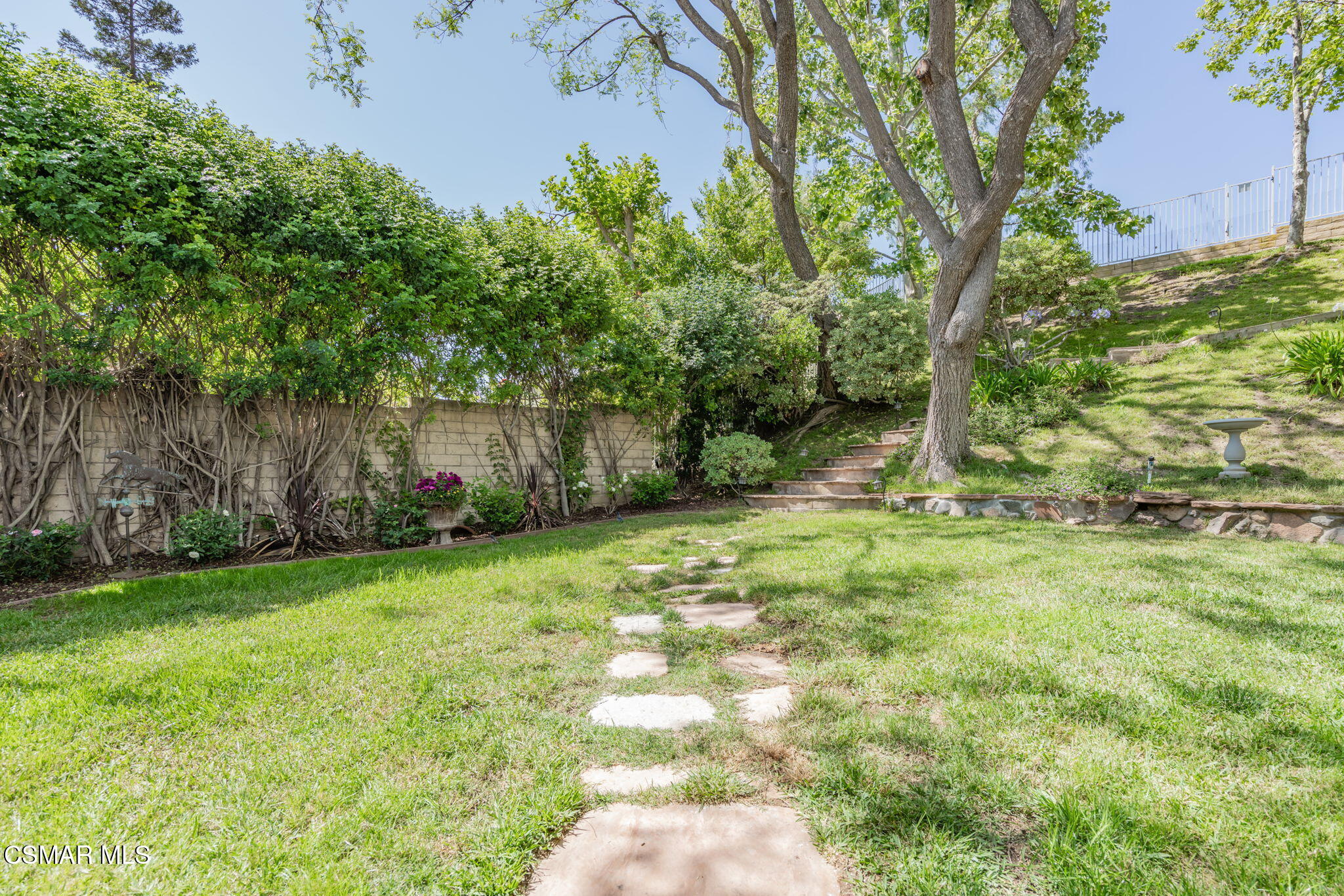 15591 Harte Lane Moorpark, CA 93021 - Photo 38 of 52 a backyard of a house with lots of green space