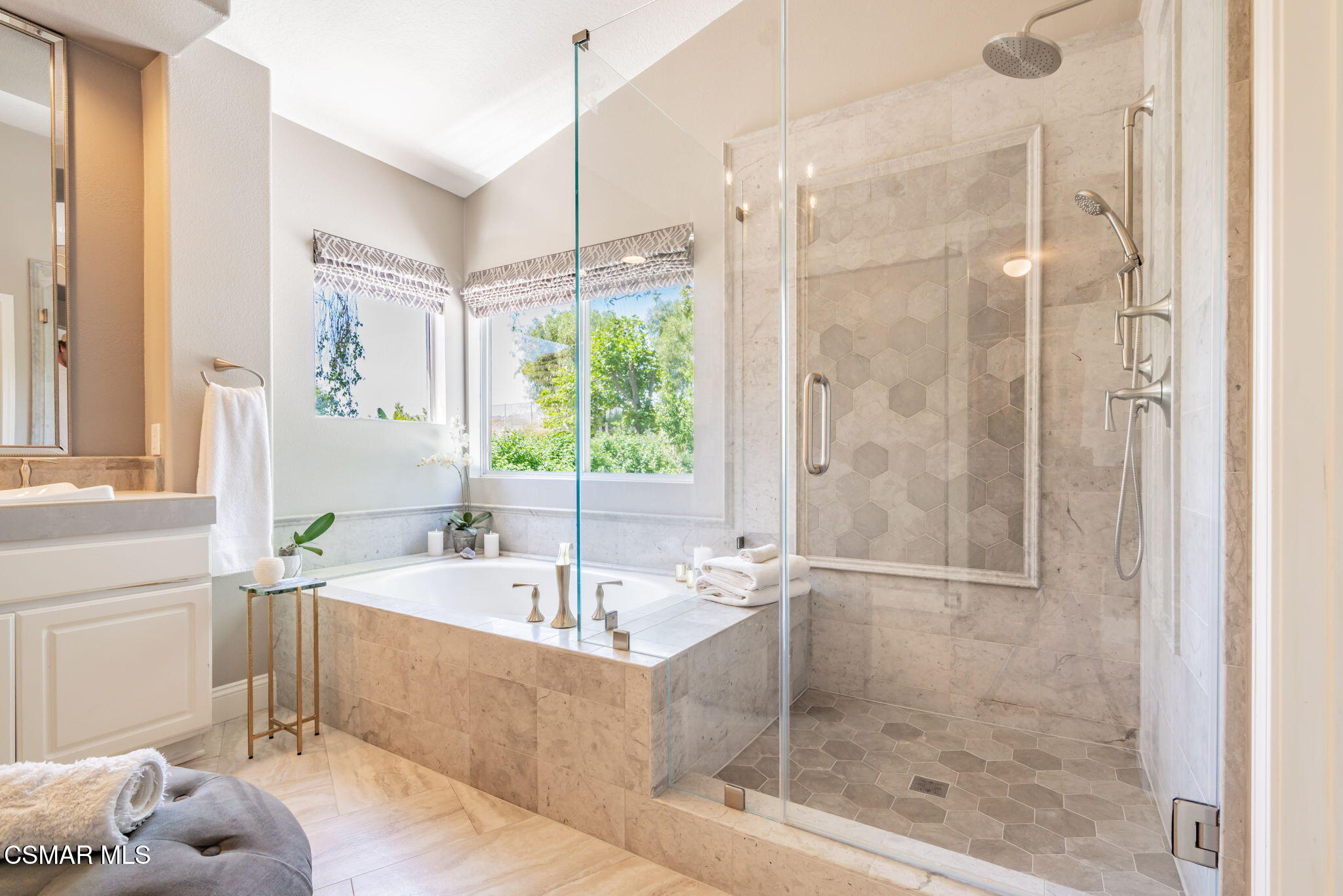 15591 Harte Lane Moorpark, CA 93021 - Photo 4 of 52 a bathroom with a tub shower and sink