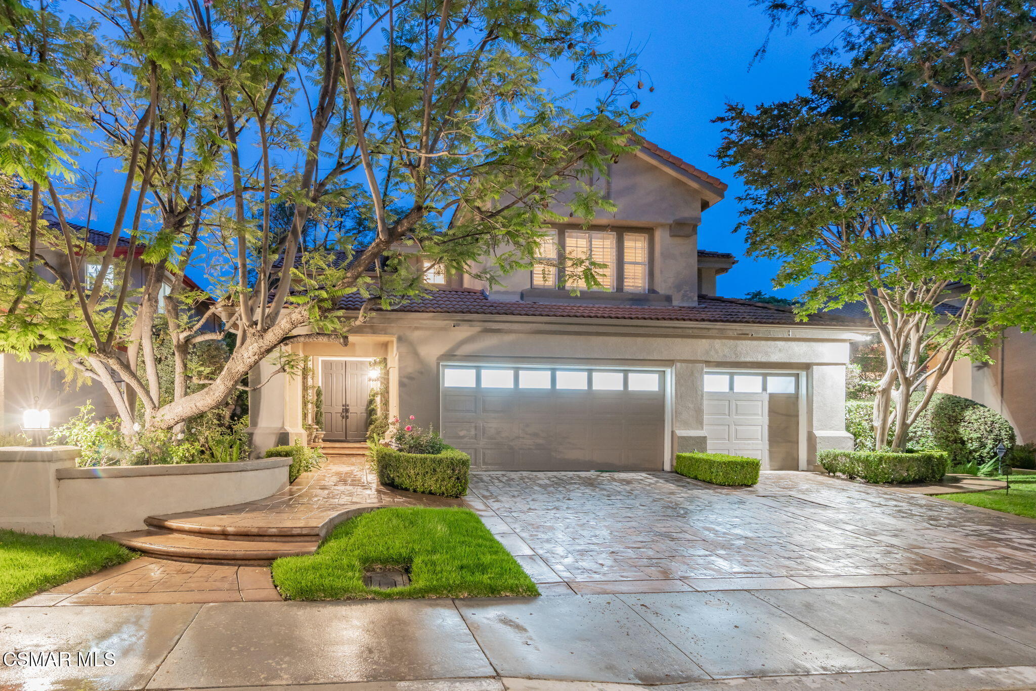 15591 Harte Lane Moorpark, CA 93021 - Photo 42 of 52 a front view of a house with a garden and plants