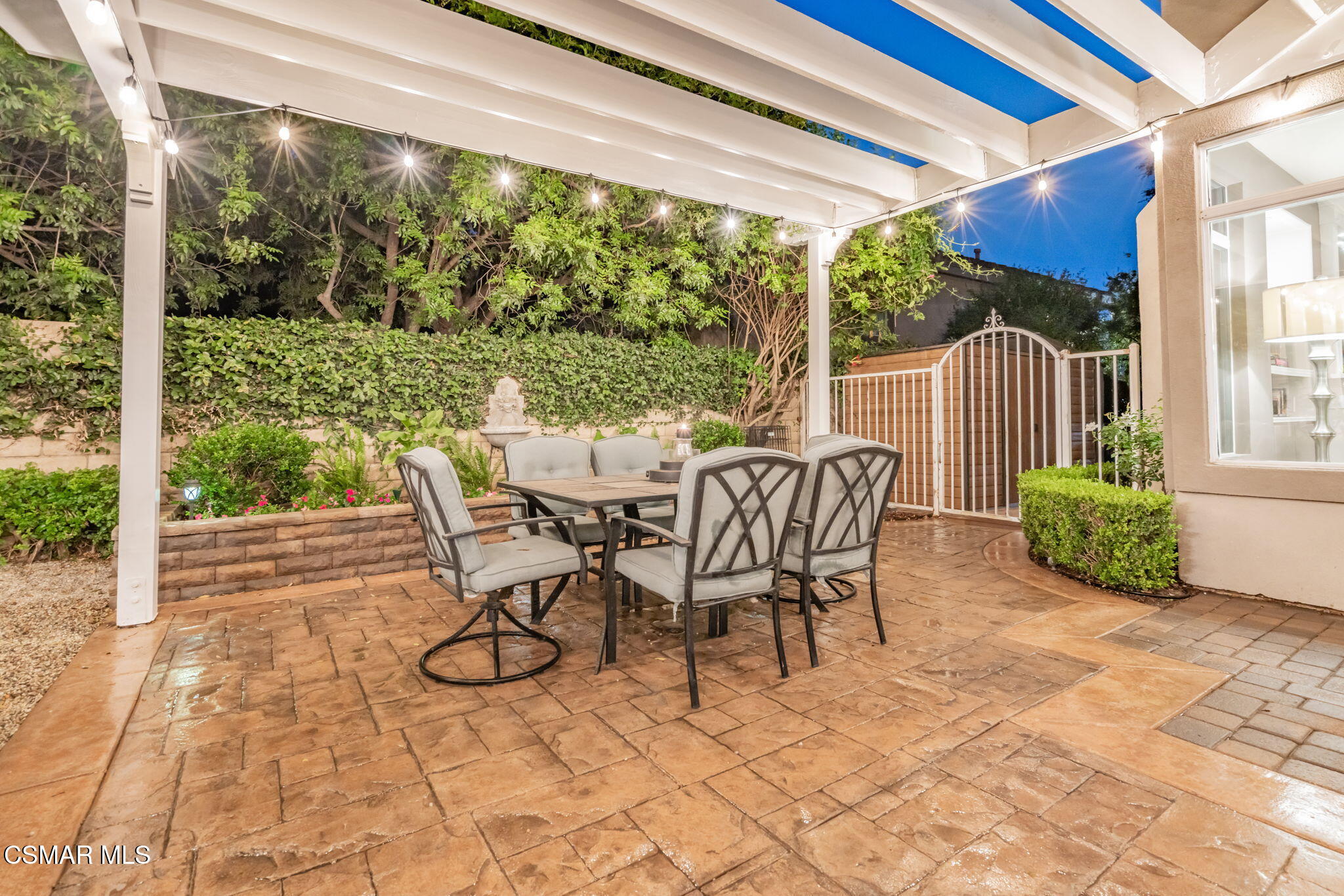 15591 Harte Lane Moorpark, CA 93021 - Photo 45 of 52 a view of a patio with a table chairs and backyard