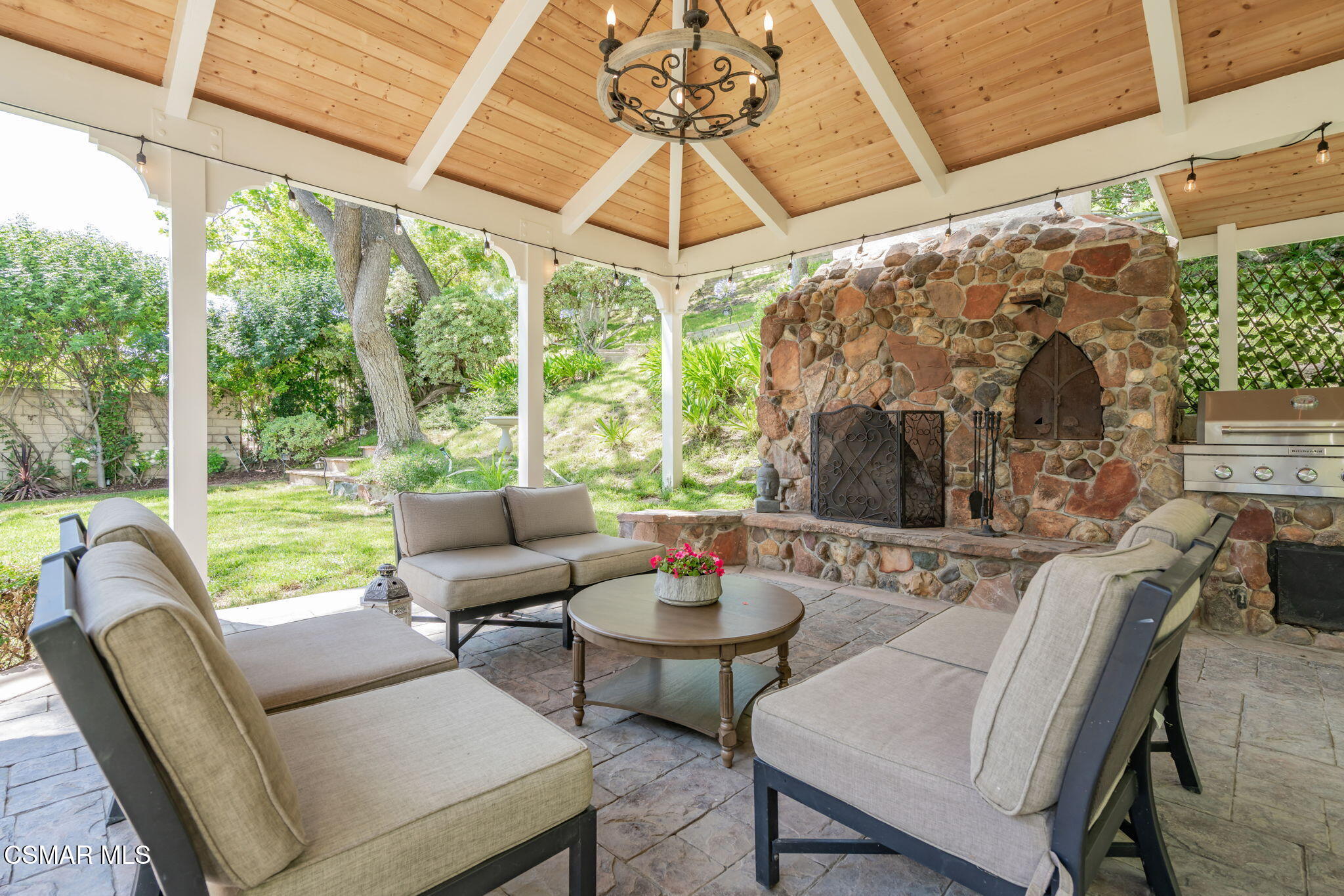 15591 Harte Lane Moorpark, CA 93021 - Photo 5 of 52 a outdoor living space with patio furniture and a potted plant
