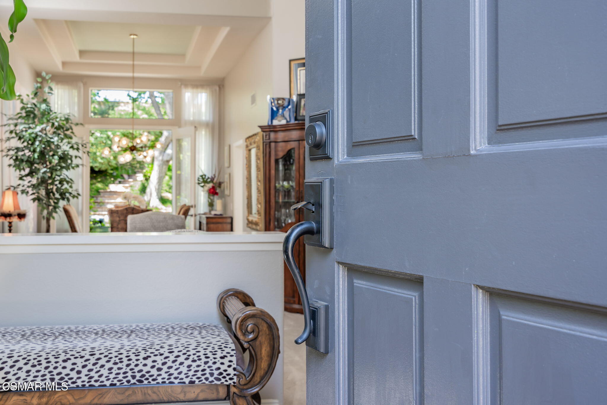 15591 Harte Lane Moorpark, CA 93021 - Photo 6 of 52 a view of front door with chair and potted plants