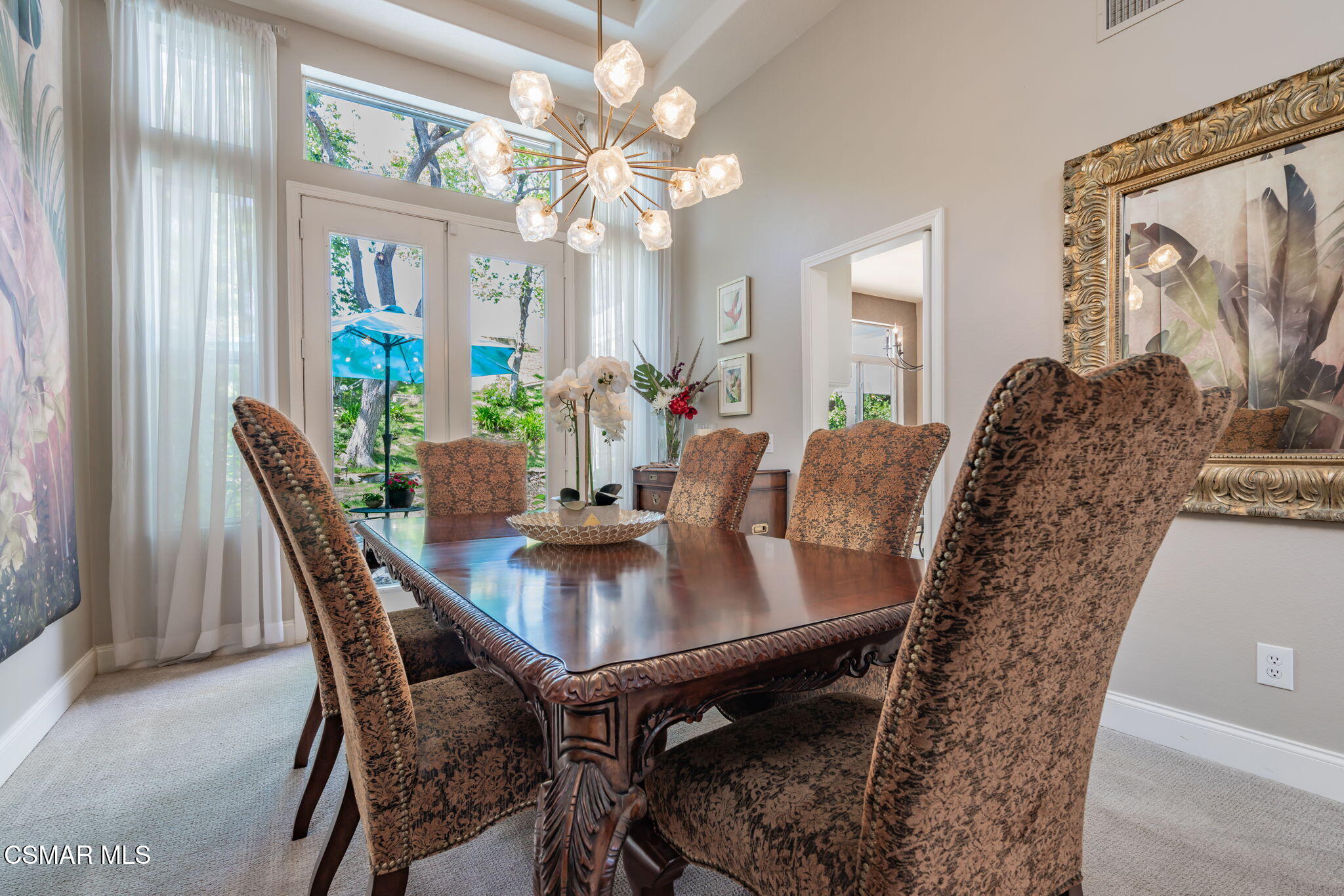 15591 Harte Lane Moorpark, CA 93021 - Photo 8 of 52 a view of a dining room with furniture and chandelier