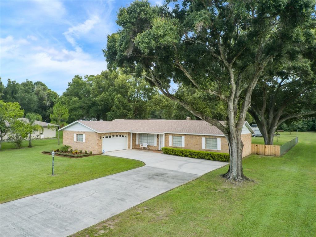 a house with garden in front of it