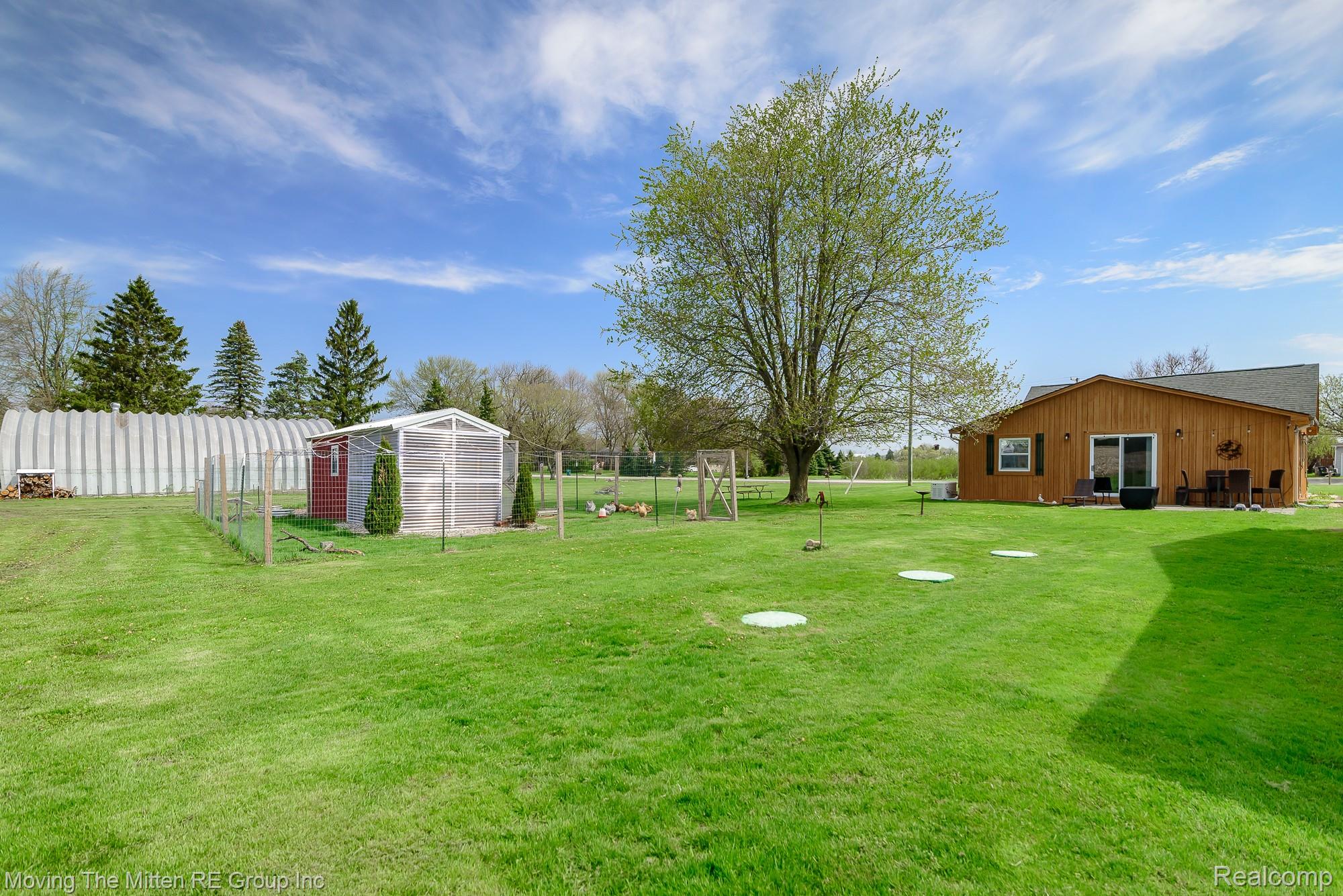 9260 Pitman Road Ypsilanti, MI 48197 - Photo 4 of 45 View of yard featuring an outbuilding