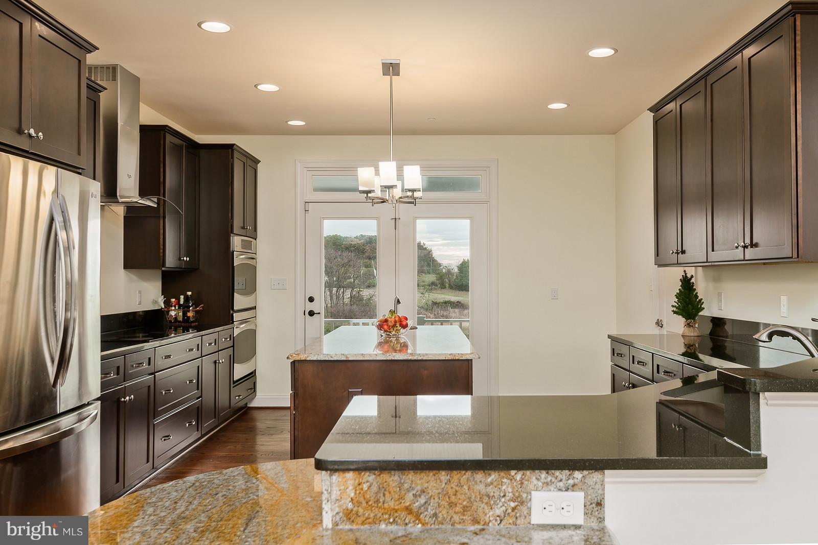 10138 Masser Road Frederick, MD 21702 - Photo 12 of 30 Kitchen Opens to Windows & Glass Doors