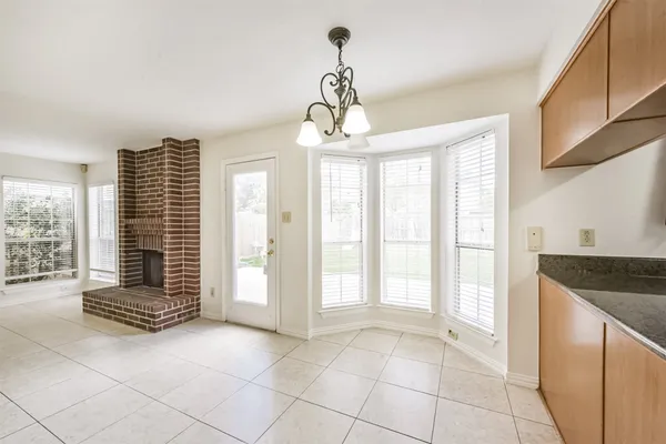 a view of an entryway with kitchen
