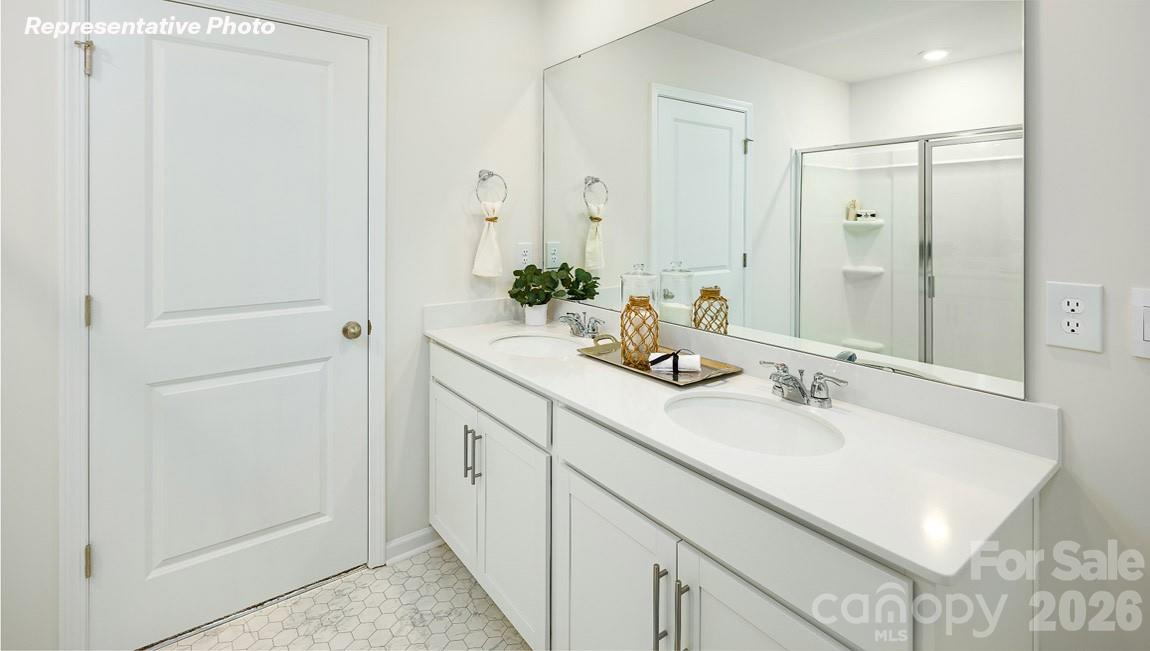 7612 Bainbridge Road Sherrills Ford, NC 28673 - Photo 22 of 37 a bathroom with a sink and a mirror