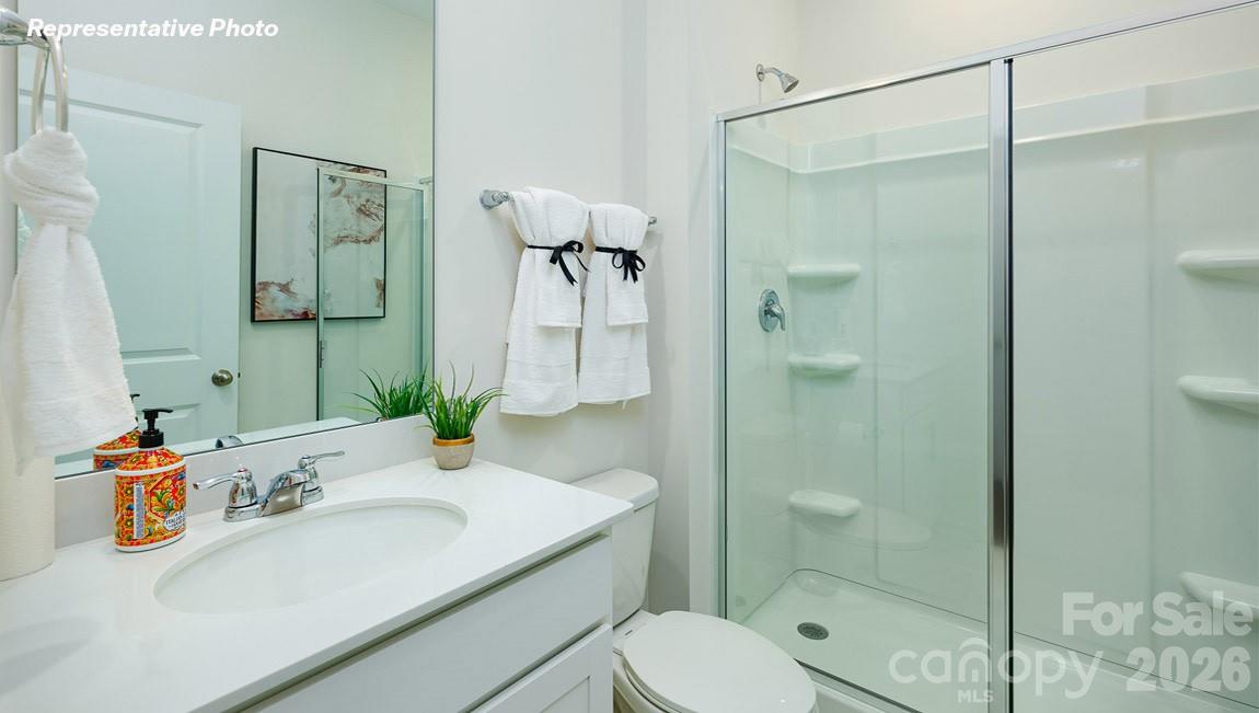 7612 Bainbridge Road Sherrills Ford, NC 28673 - Photo 26 of 37 a bathroom with a sink toilet and shower