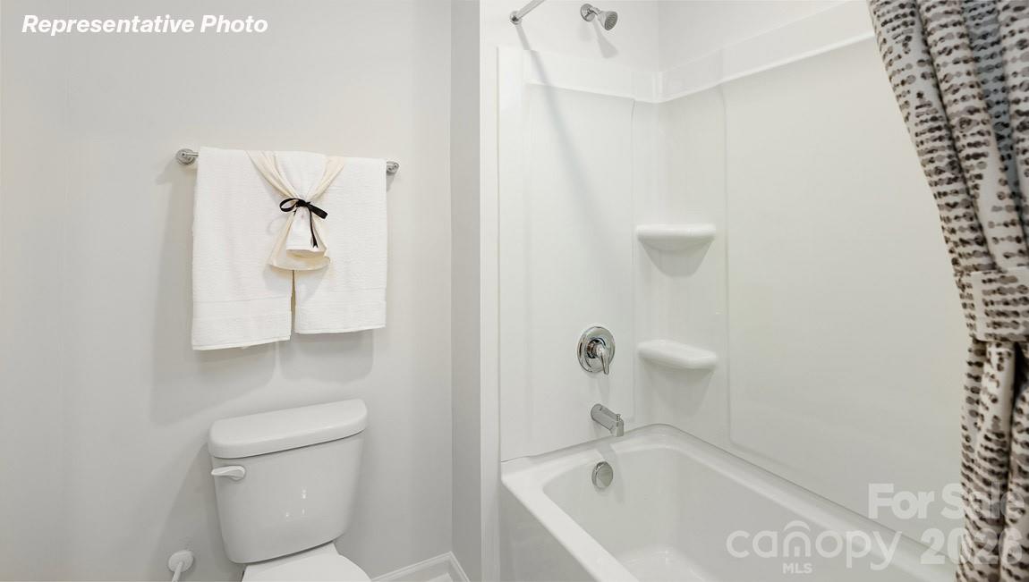 7612 Bainbridge Road Sherrills Ford, NC 28673 - Photo 34 of 37 a bathroom with a bathtub