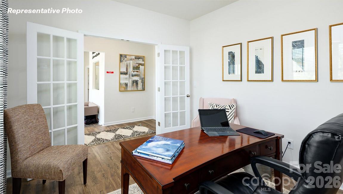 7612 Bainbridge Road Sherrills Ford, NC 28673 - Photo 36 of 37 a view of a workspace with furniture and a potted plant