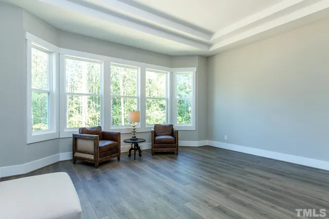 a bathroom with a sink a mirror and a toilet