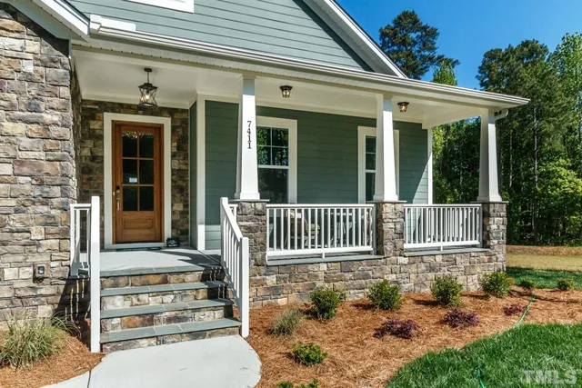 front view of a house with a porch