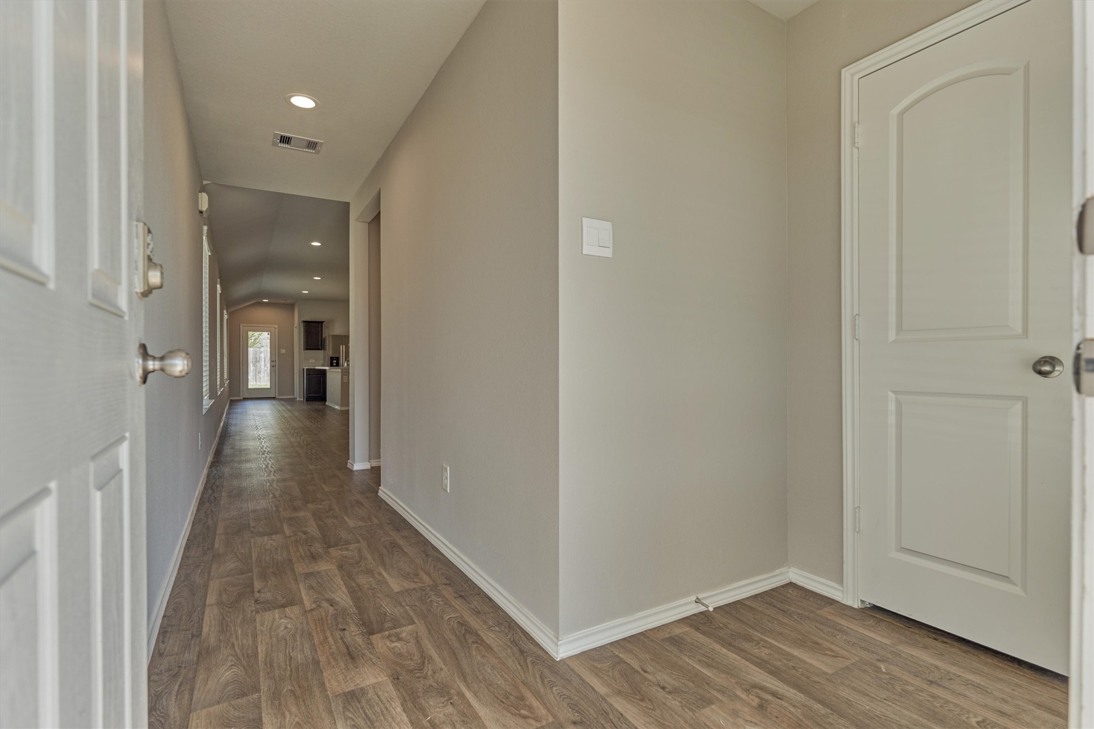 22630 Winter Maple Trail Spring, TX 77373 - Photo 4 of 31 a view of a hallway with wooden floor