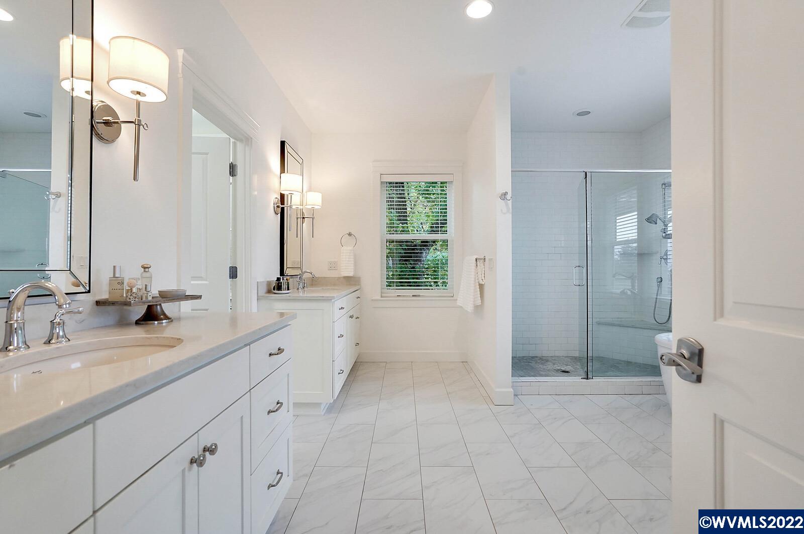 1895 Rio Vista Way South Salem, OR 97302 - Photo 24 of 42 a spacious bathroom with a double vanity sink mirror and shower