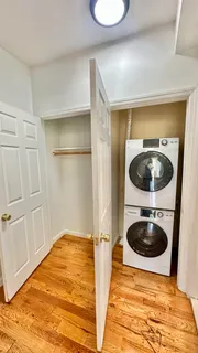 a view of bathroom with bathtub and shower
