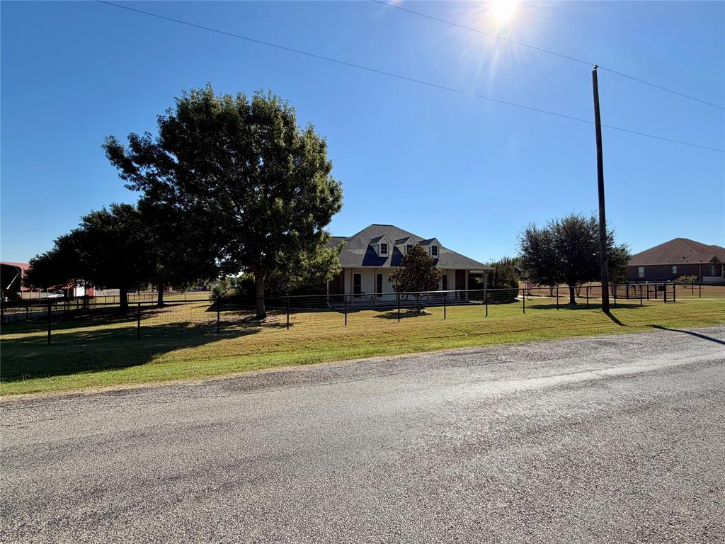 1333 East Highland Road Waxahachie, TX 75167 - Photo 2 of 33 a view of swimming pool is middle in the middle of a yard