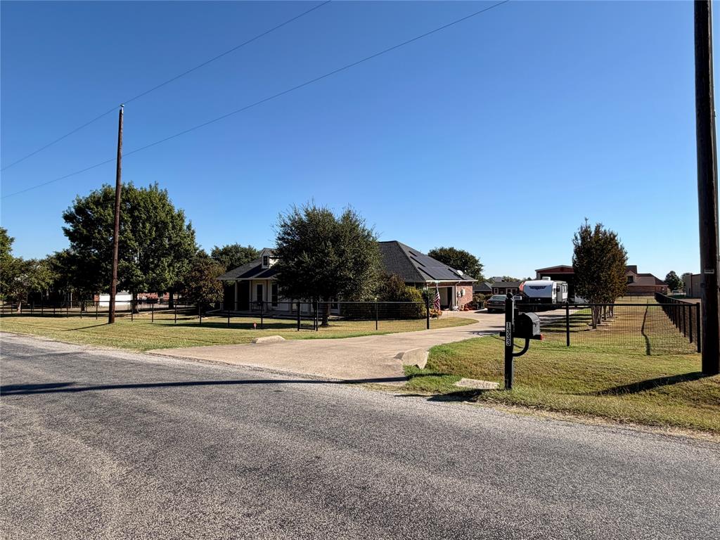 1333 East Highland Road Waxahachie, TX 75167 - Photo 3 of 33 a view of a swimming pool with an outdoor space and seating area