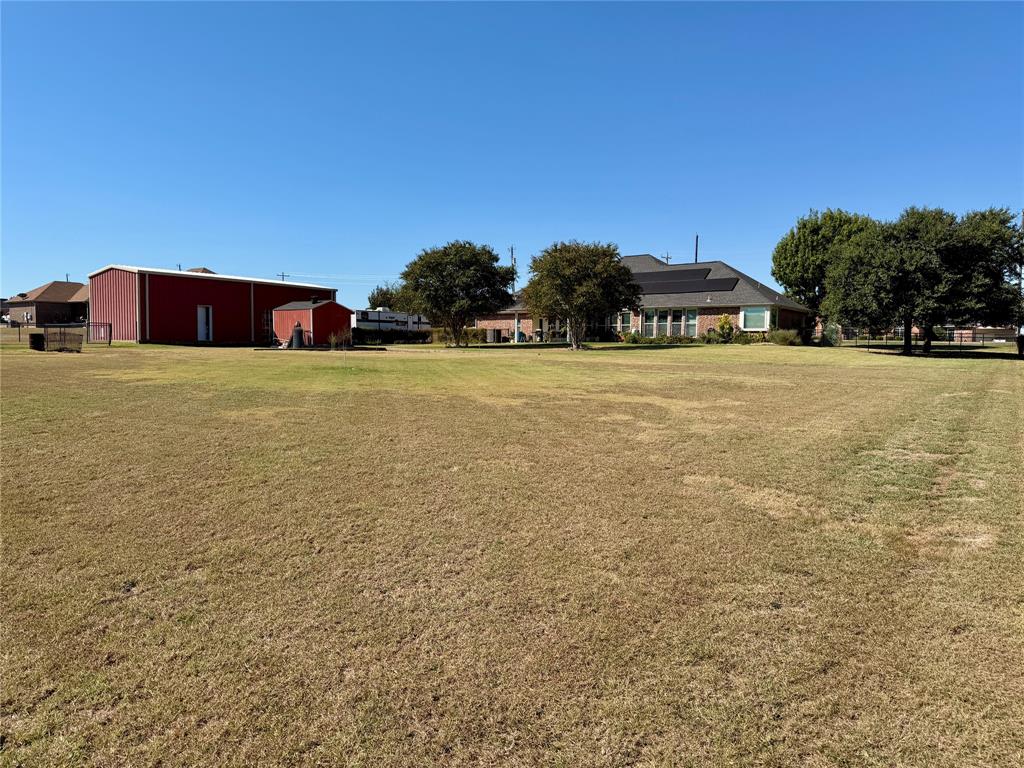 1333 East Highland Road Waxahachie, TX 75167 - Photo 33 of 33 a front view of a house with a yard