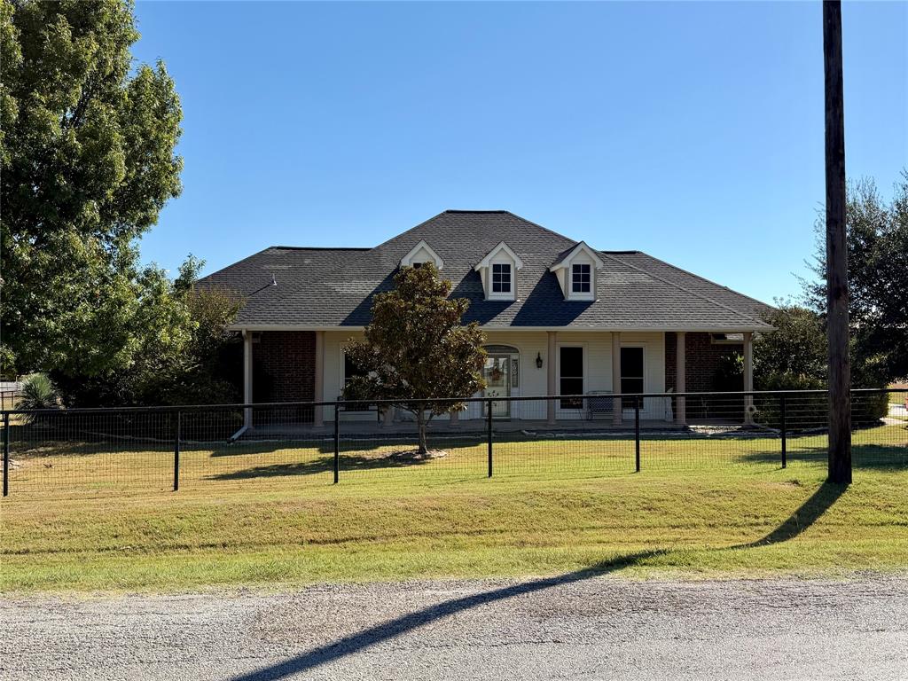 1333 East Highland Road Waxahachie, TX 75167 - Photo 4 of 33 a view of a swimming pool with a patio