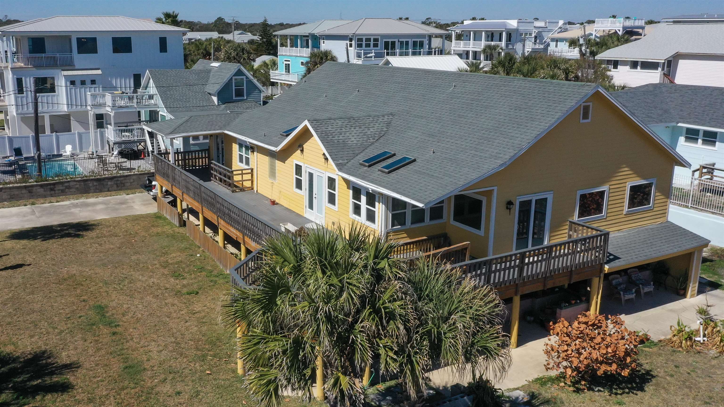 2 11th Street St. Augustine Beach, FL 32080 - Photo 15 of 72 an aerial view of a house with a yard and balcony