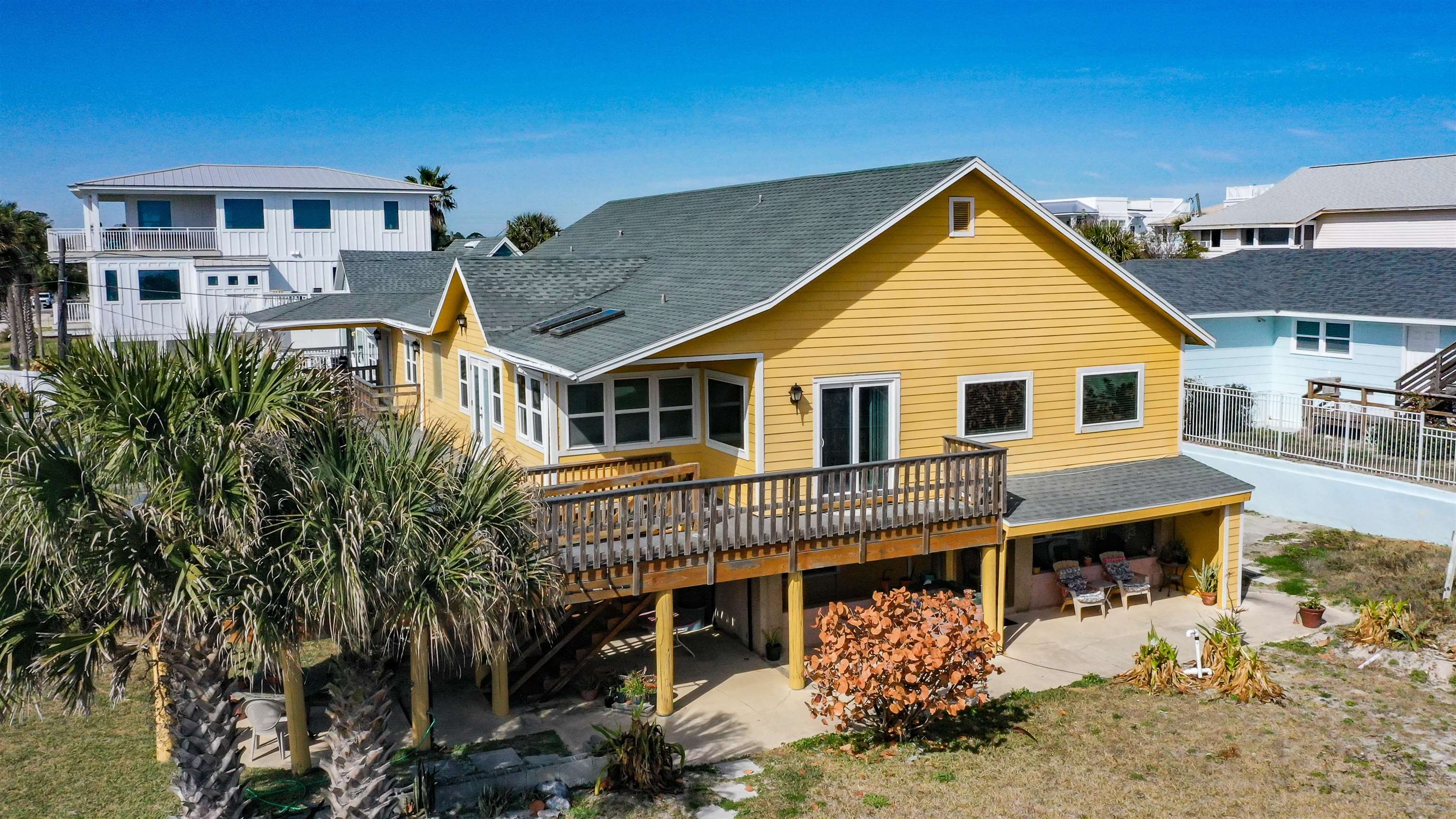 2 11th Street St. Augustine Beach, FL 32080 - Photo 37 of 72 Rear view of property featuring a patio, a deck, and a shingled roof