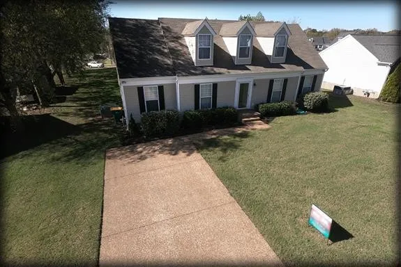 a view of house with outdoor space