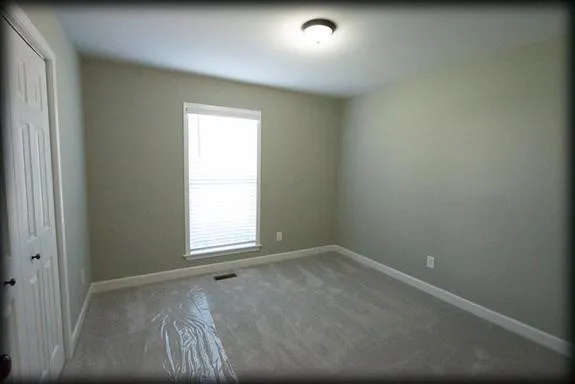 an empty room with a window