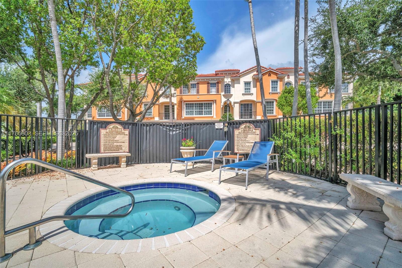 616 Northeast Venezia Lane, Unit 616 Boca Raton, FL 33487 - Photo 31 of 64 COMMUNITY POOL AREA