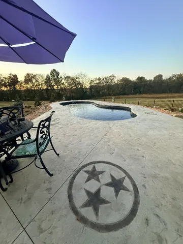 a bedroom with a bed and flat screen tv