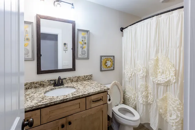 a view of wooden fence and floor