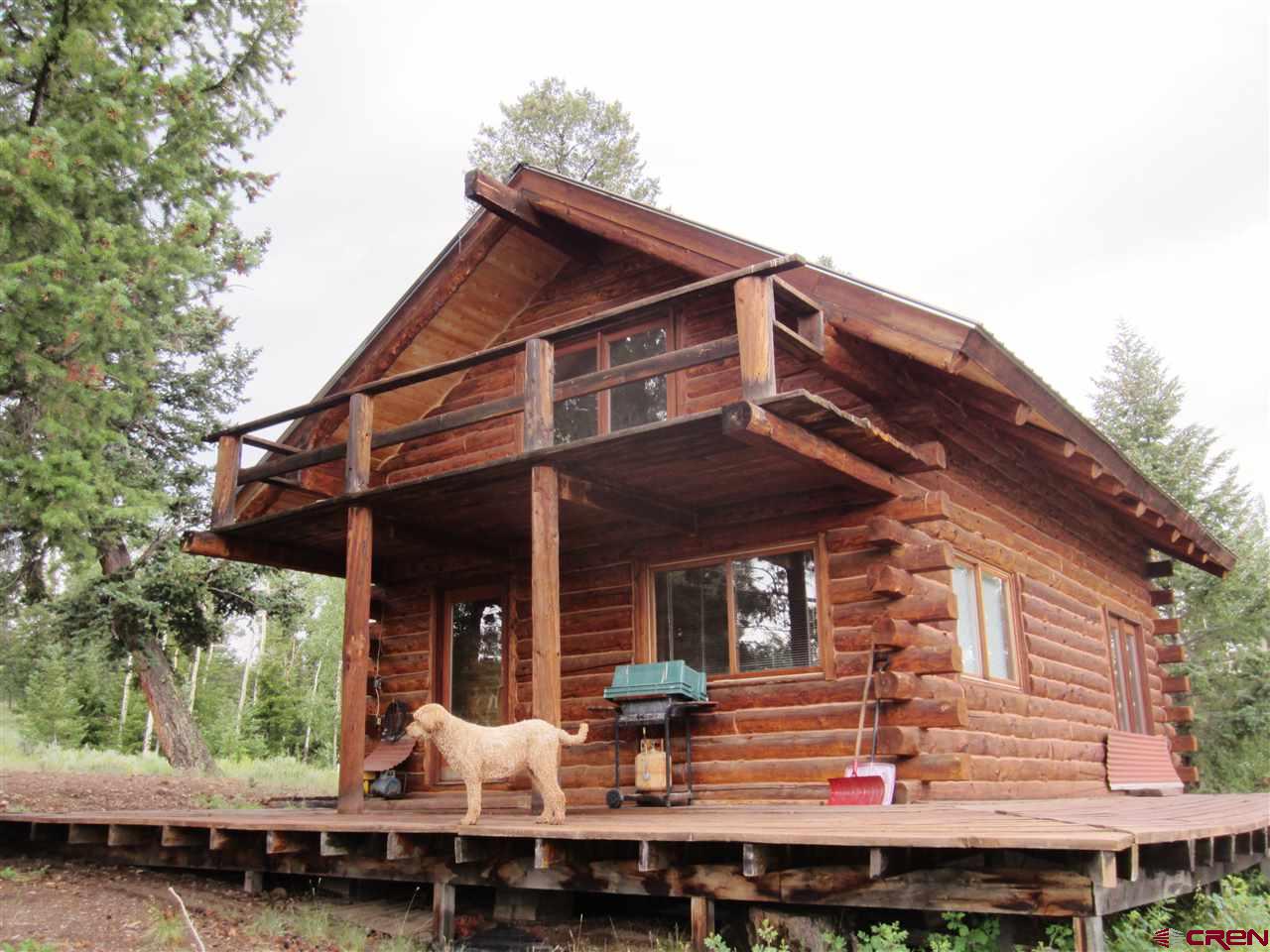 Blm Road 3063 Gunnison, CO 81230 - Photo 12 of 15 a view of house with wooden deck and furniture