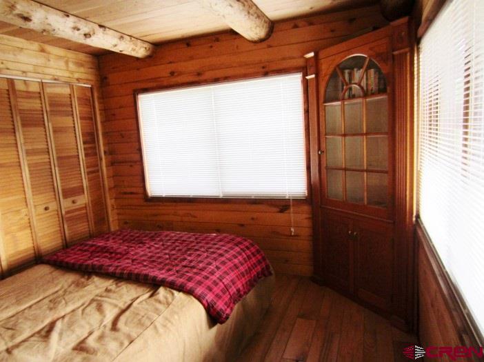 Blm Road 3063 Gunnison, CO 81230 - Photo 13 of 15 a bedroom with a bed and a window