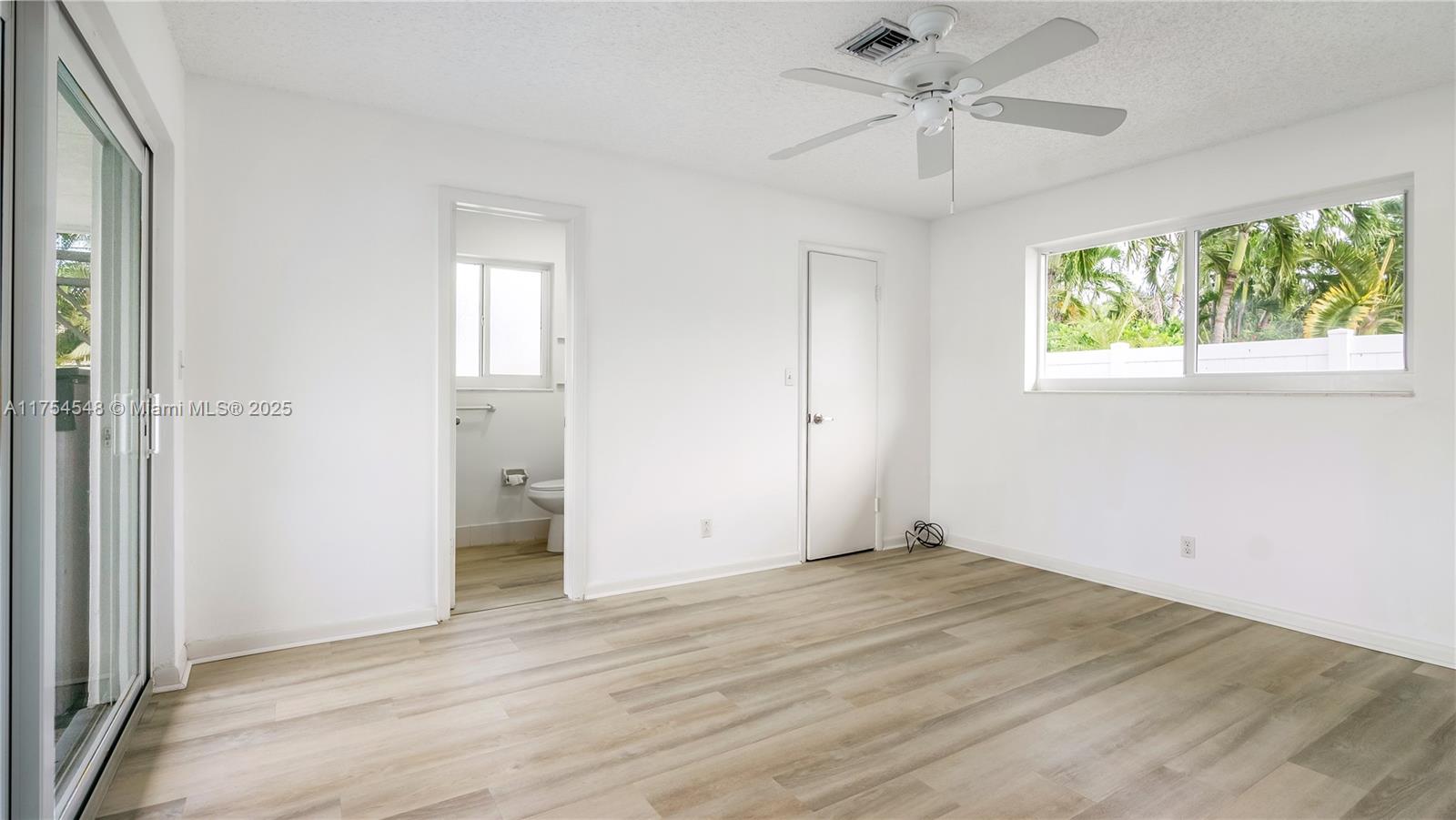 28 Southwest 9th Avenue Boca Raton, FL 33486 - Photo 20 of 27 a view of an empty room with a window