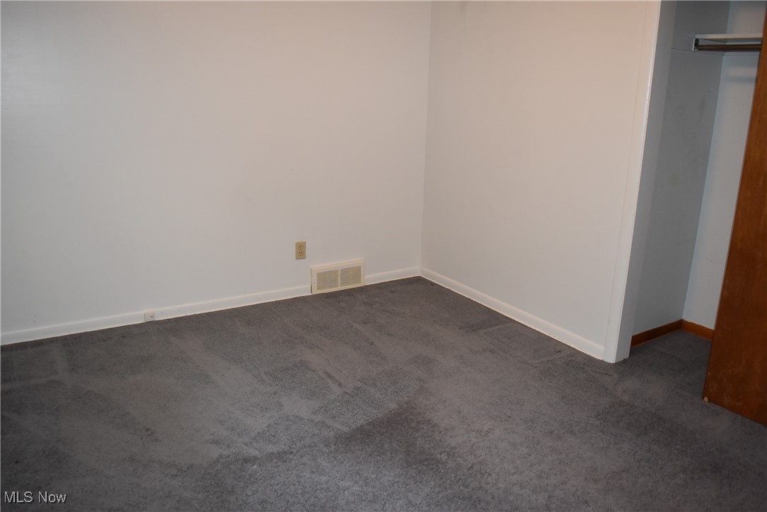 608 Gibbs Road Akron, OH 44312 - Photo 8 of 40 View of carpeted spare room