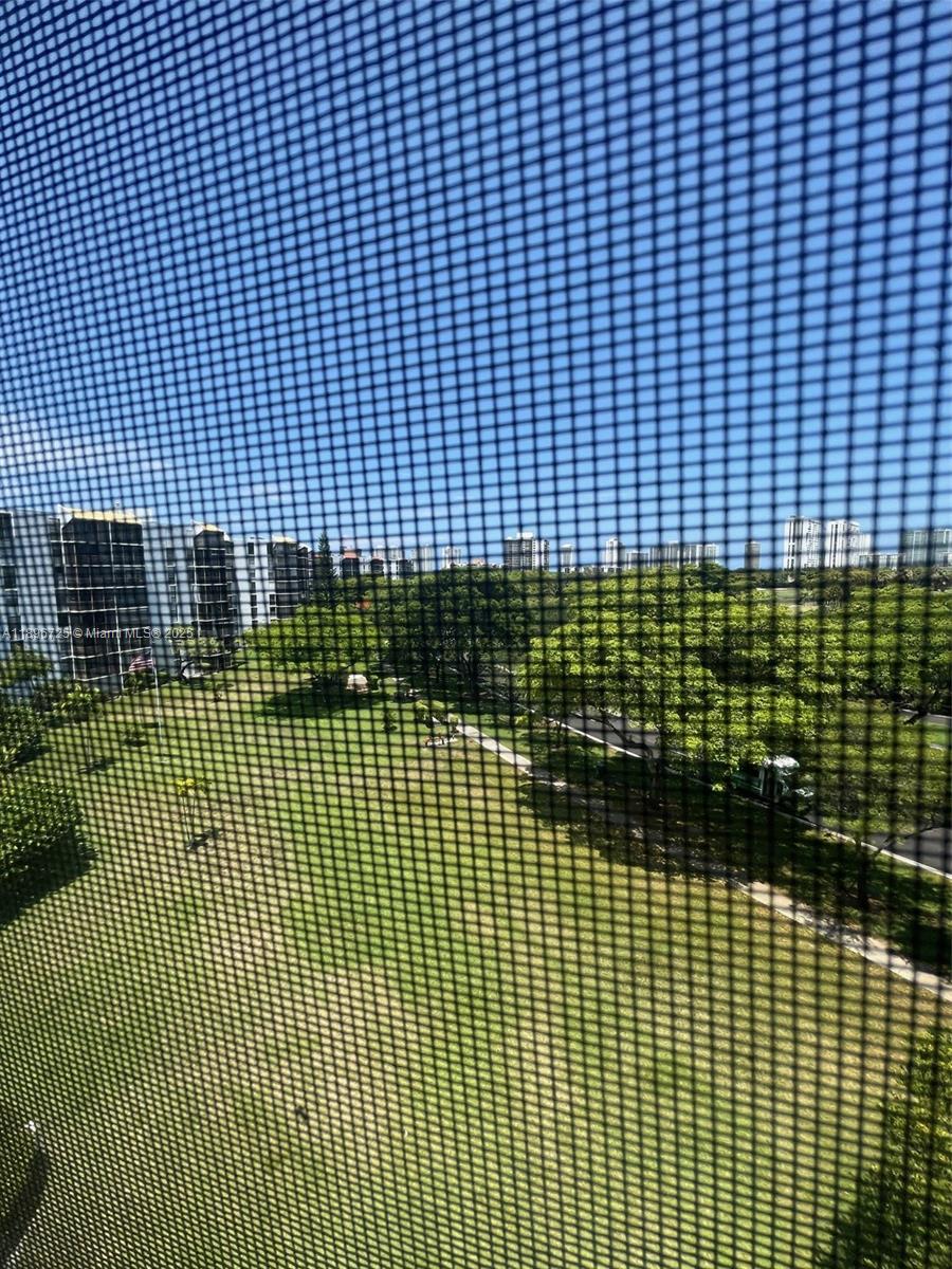 20400 West Country Club Drive, Unit 608 Aventura, FL 33180 - Photo 15 of 19 a view of a brick building and city view