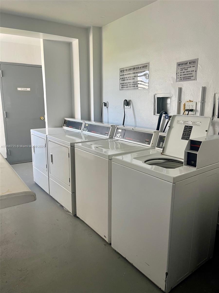 20400 West Country Club Drive, Unit 608 Aventura, FL 33180 - Photo 3 of 19 a view of kitchen and sink