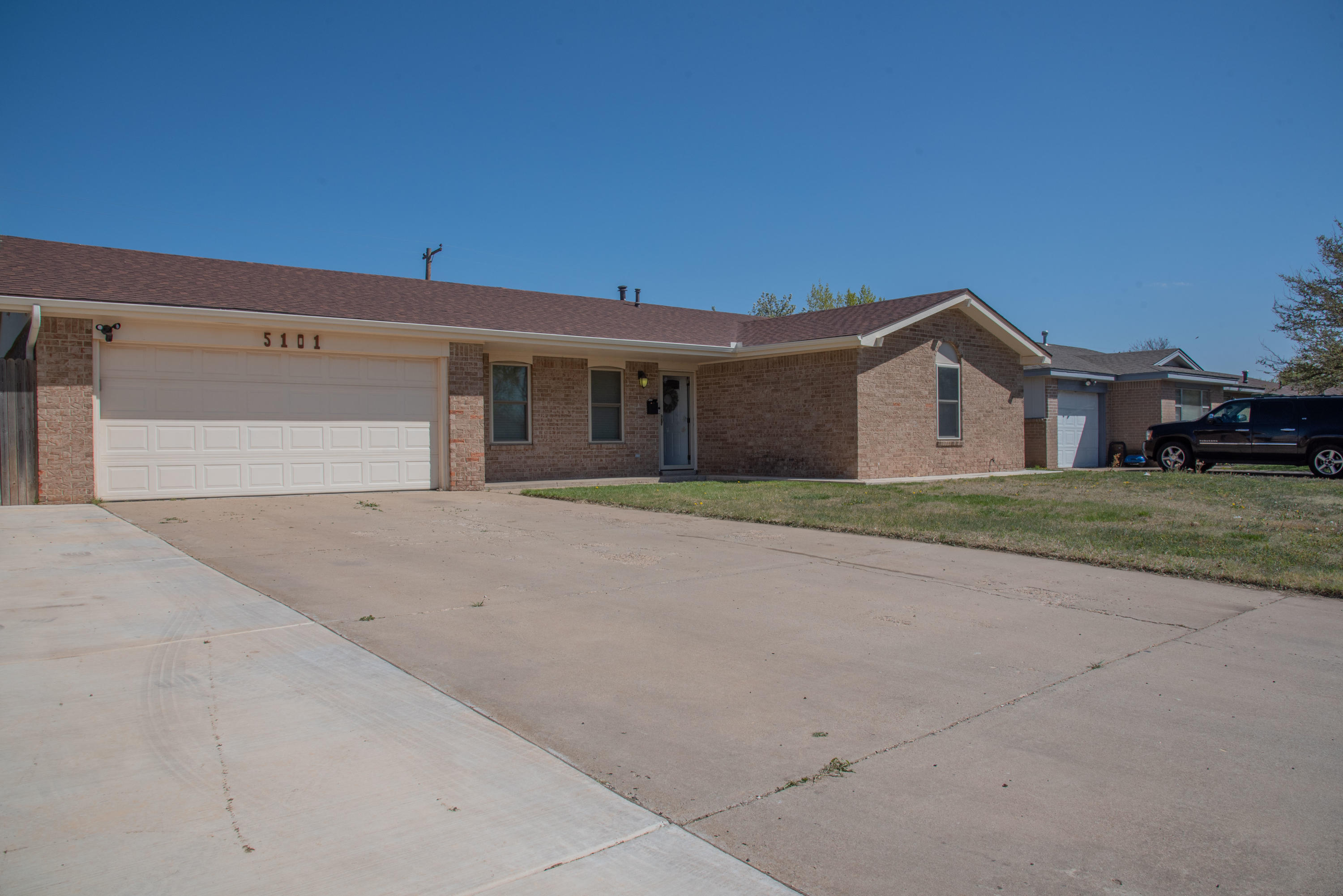 5101 South Austin Street Amarillo, TX 79110 - Photo 2 of 24 front view of house with a yard