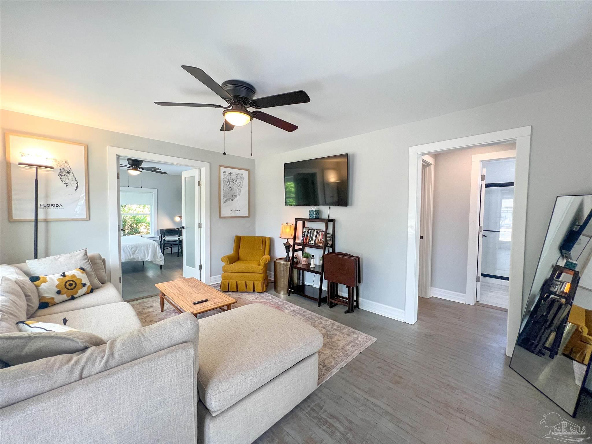 1315 Dexter Avenue Pensacola, FL 32507 - Photo 17 of 22 a living room with furniture and a flat screen tv